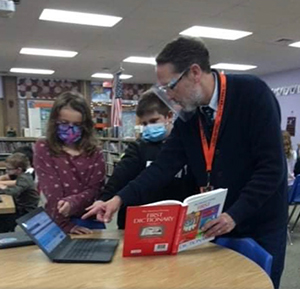 Mr. Koehler of Port Allegany SD working with students