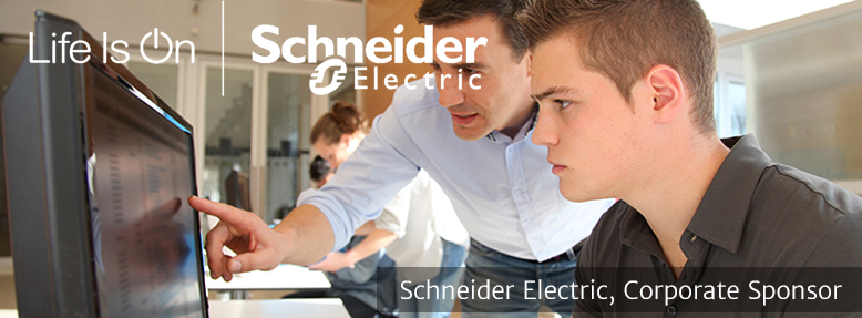 Student and Teacher at Computer | Schneider Electric Sponsor
